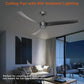 Ceiling fan with LED light in a living room setting, three dark blades and flush mount