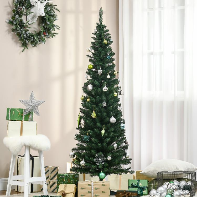 Artificial pencil Christmas tree with green needles and visible ornaments including white baubles