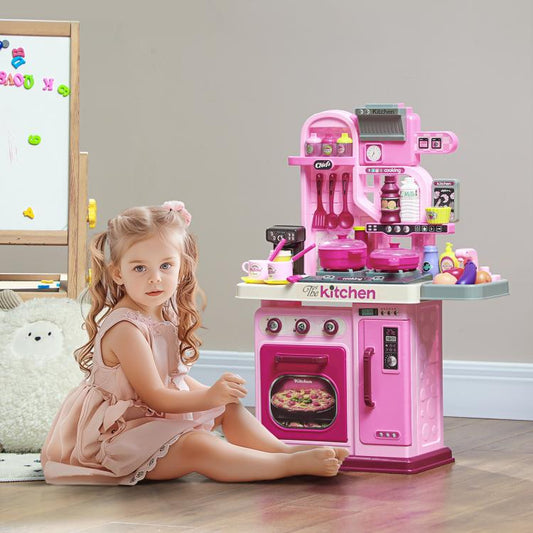 Pink kids play kitchen toy with oven window, stove knobs and included cookware set