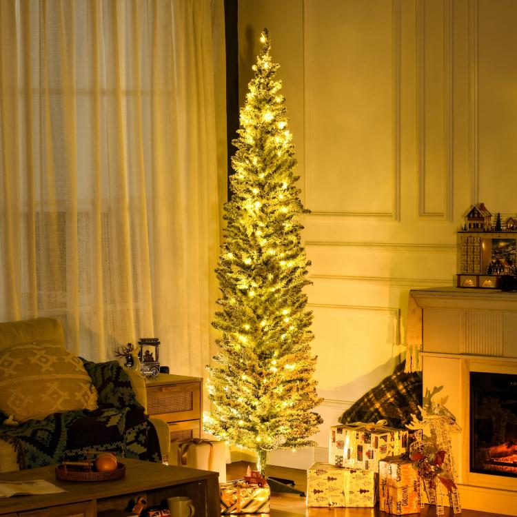 Tall slim artificial Christmas pencil tree with warm white light strands