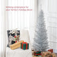 Silver unlit pencil artificial Christmas tree near wrapped presents and holiday decor