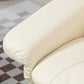 Cream white PU leather recliner armrest and padded seat cushion close-up.