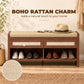 Brown shoe bench with cushioned seat and two rattan-style drawer fronts, open shoe shelf