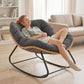Oversized dark gray rocking egg chair with cushion, woven base and black metal frame