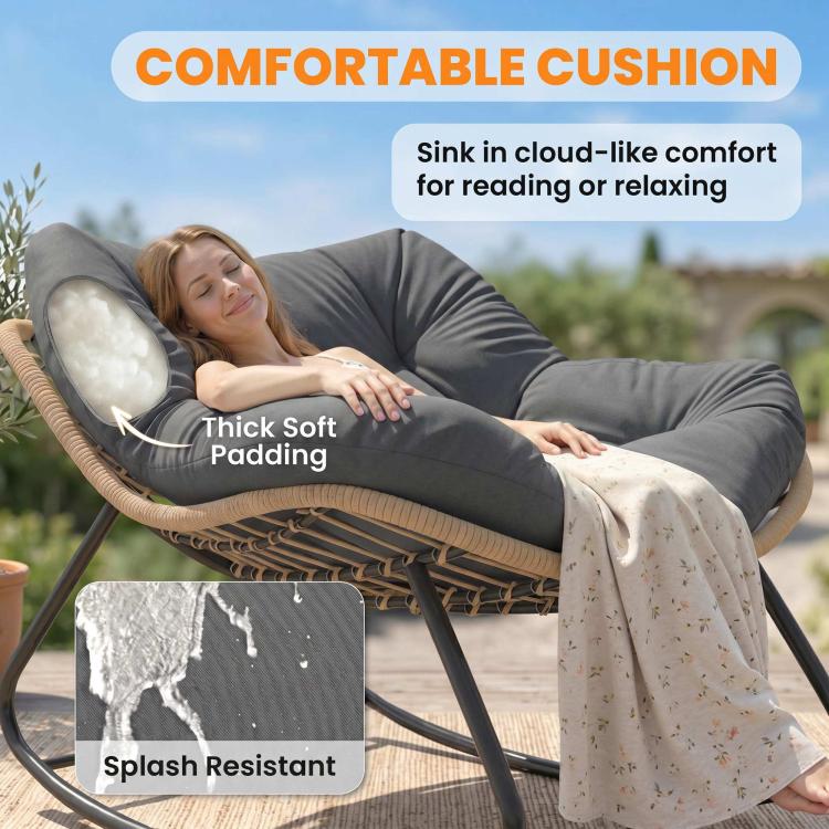 Dark gray papasan-style rocking chair with thick cushioned back and woven wicker base