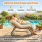 Cream cushioned rocking egg chair with woven rattan seat and black metal base by garden