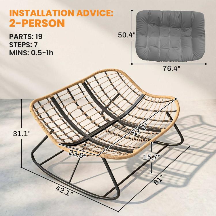 Gray cushioned papasan rocking chair with tan woven support and black rock frame
