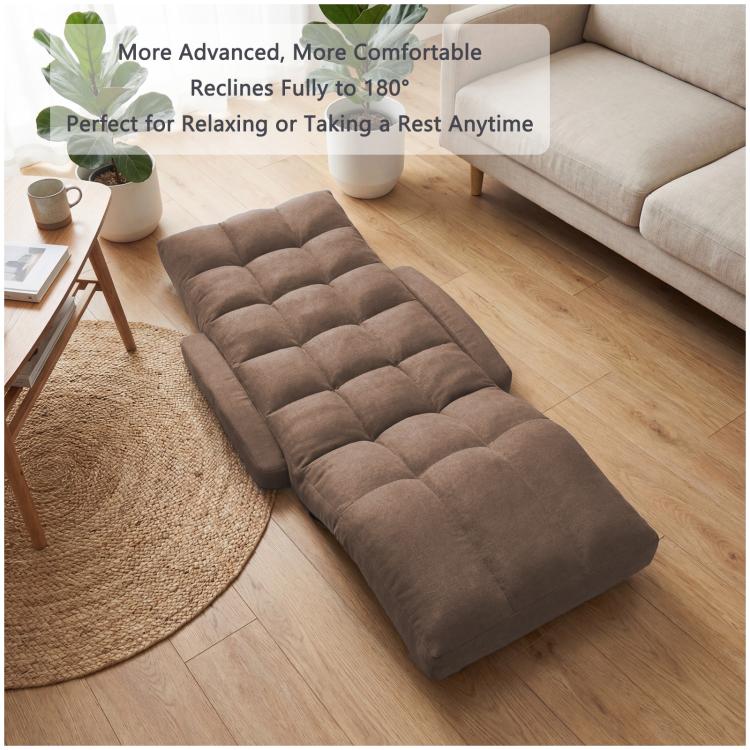 Brown cushioned floor chair reclined for lounging with contoured back support