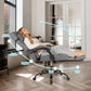 Grey reclining office chair with lumbar and neck support, wide seat, and footrest