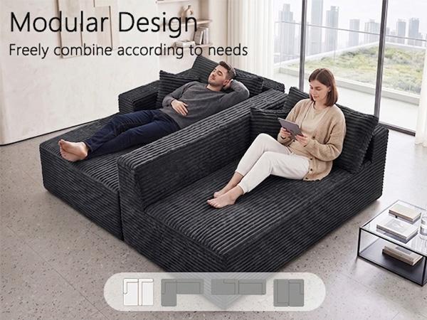 Black modular L-shaped sectional sofa with oversized chaise and thick seat cushions