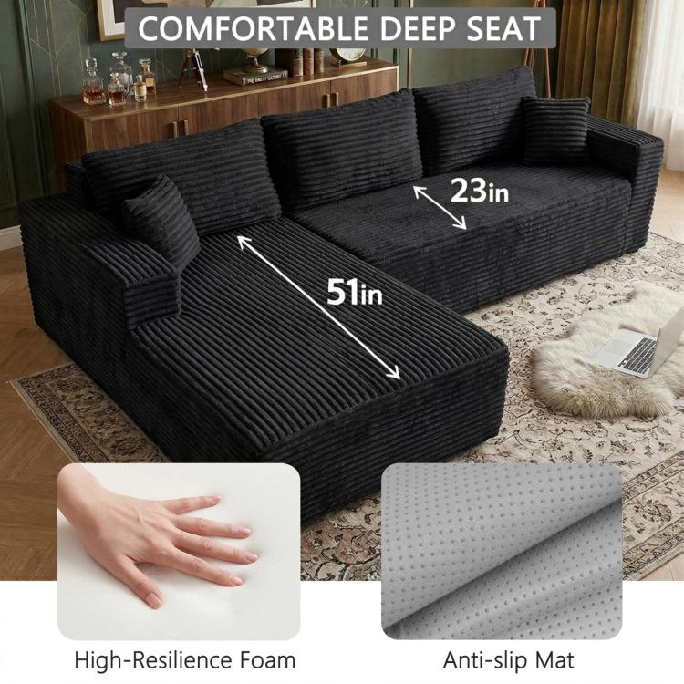 Black corduroy sectional chaise with deep seating, anti-slip mat inset