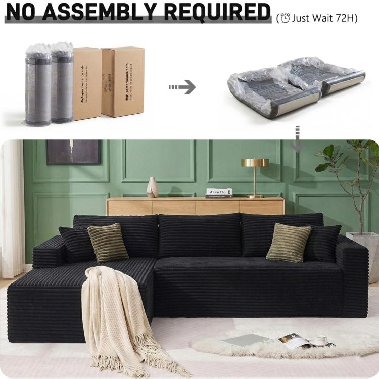 Black corduroy L-shaped sectional sofa with oversized chaise and deep cushions
