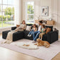 Black corduroy L-shaped sectional sofa with oversized chaise, family and dog on cushions