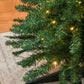 Green artificial pencil Christmas tree branch tips with warm white LED lights