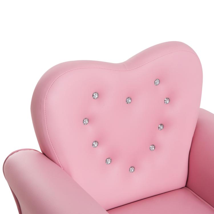 Pink heart-shaped backrest of toddler sofa chair with rhinestone button details