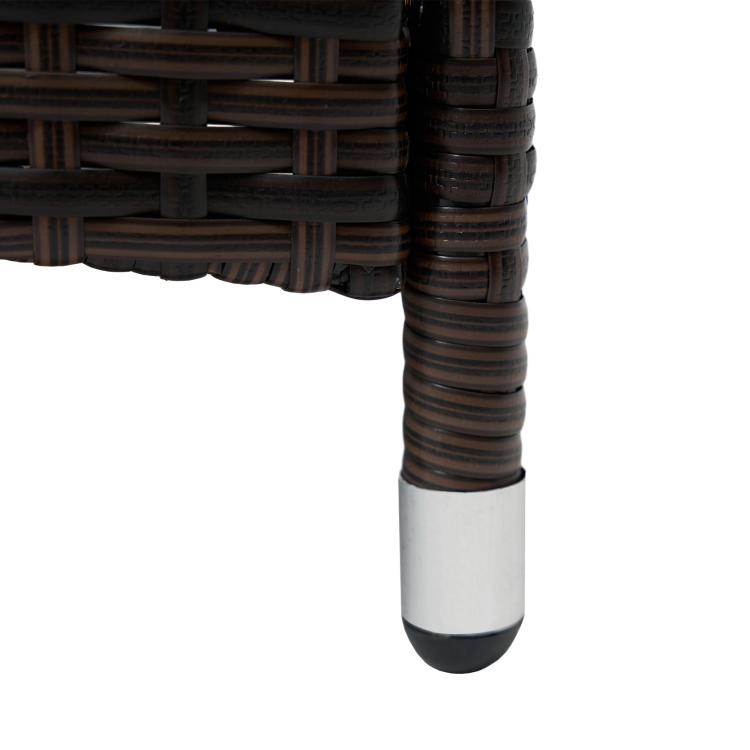 Close-up of chaise lounge leg with dark woven post and white underside support foot