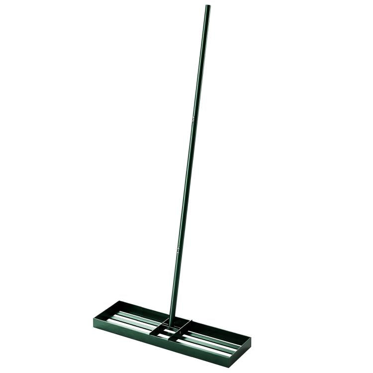 Green lawn leveling rake head with ridged bars and tall straight handle