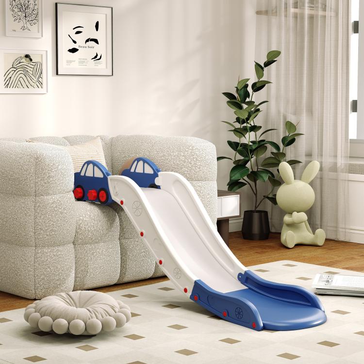 Blue and white toddler slide on the floor, with car-themed end supports