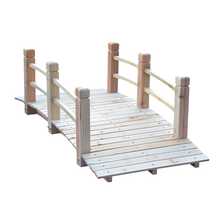 Natural wood arched garden footbridge with railings and deck walkway