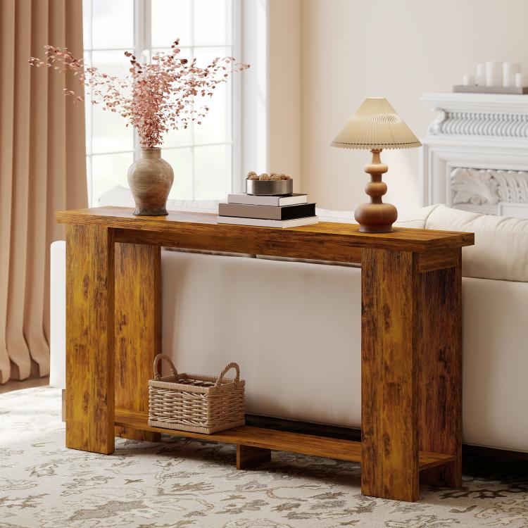 Farmhouse console table with distressed brown finish, thick top, open lower shelf