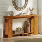 Distressed brown console table with thick top and open shelves for baskets