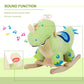 Green plush dinosaur rocking horse with blue saddle and horn press for realistic sounds