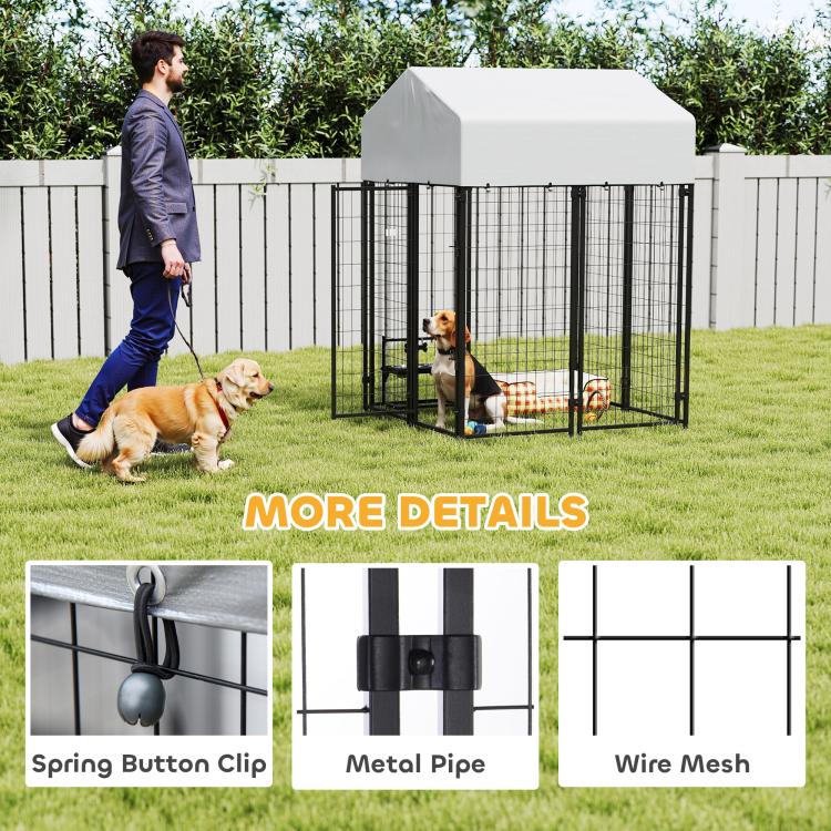 Outdoor dog kennel with white roof and black wire mesh panels, secured latch on door
