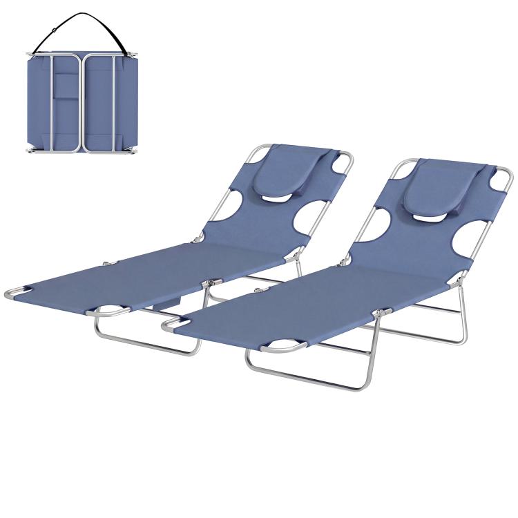Set of two outdoor chaise lounges with dark blue cushions, face openings, and adjustable reclining backs