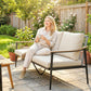 3-seater outdoor patio sofa with beige cushions, wood-effect arms, black metal frame