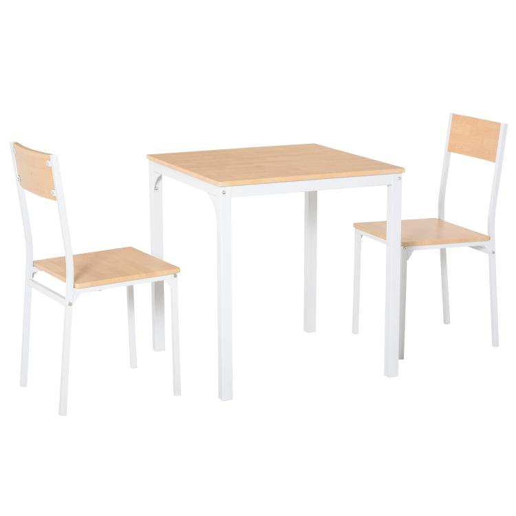 Square white dining table with two wood-tone chairs, open-frame metal supports.