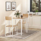 White dining table set with square tabletop and two wood-tone chairs in a room.