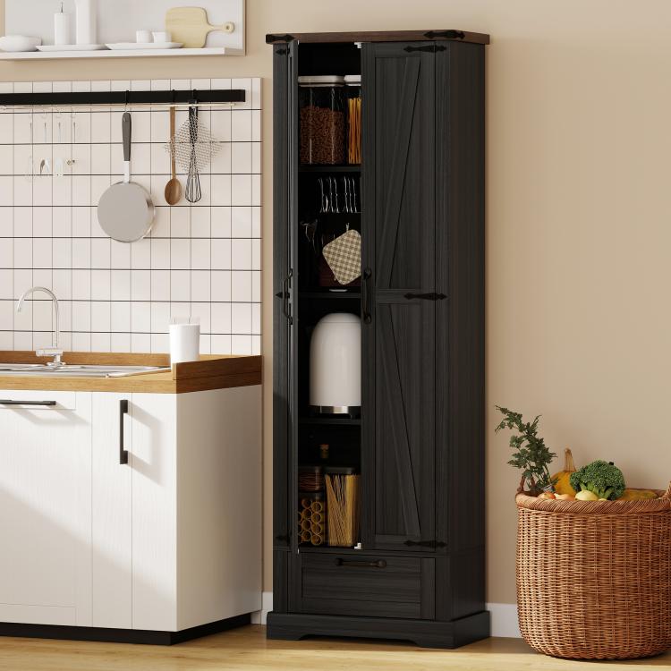Black pantry cabinet with barn doors open, interior storage compartments and pull drawer