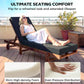 Dark gray chaise lounge cushion on outdoor chaise chair, headrest included