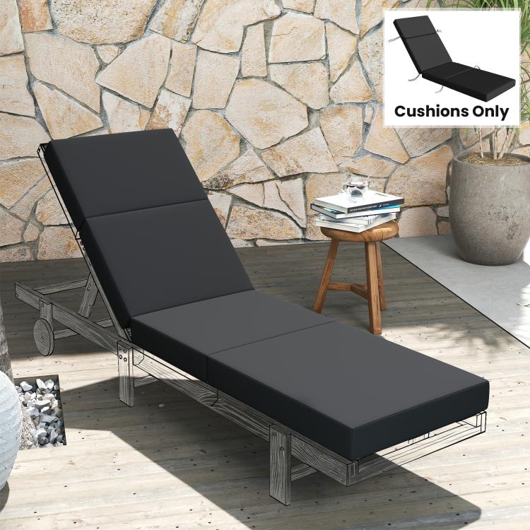 Outdoor chaise lounge cushion in dark gray with headrest and long padded seat