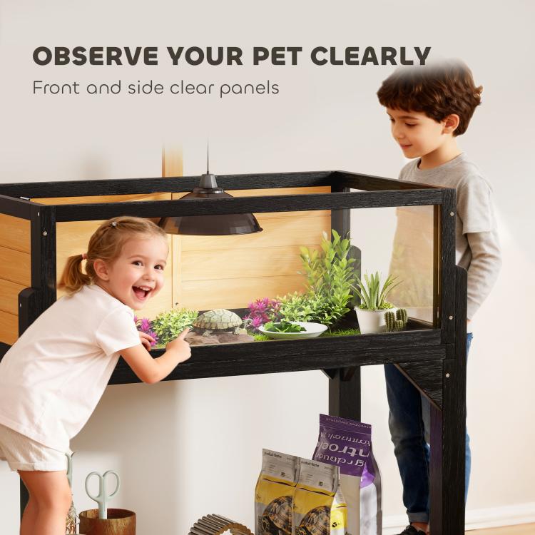Wooden tortoise habitat with clear front and side panels for viewing pets