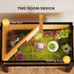 Wooden two-room tortoise habitat with grass bedding and basking area
