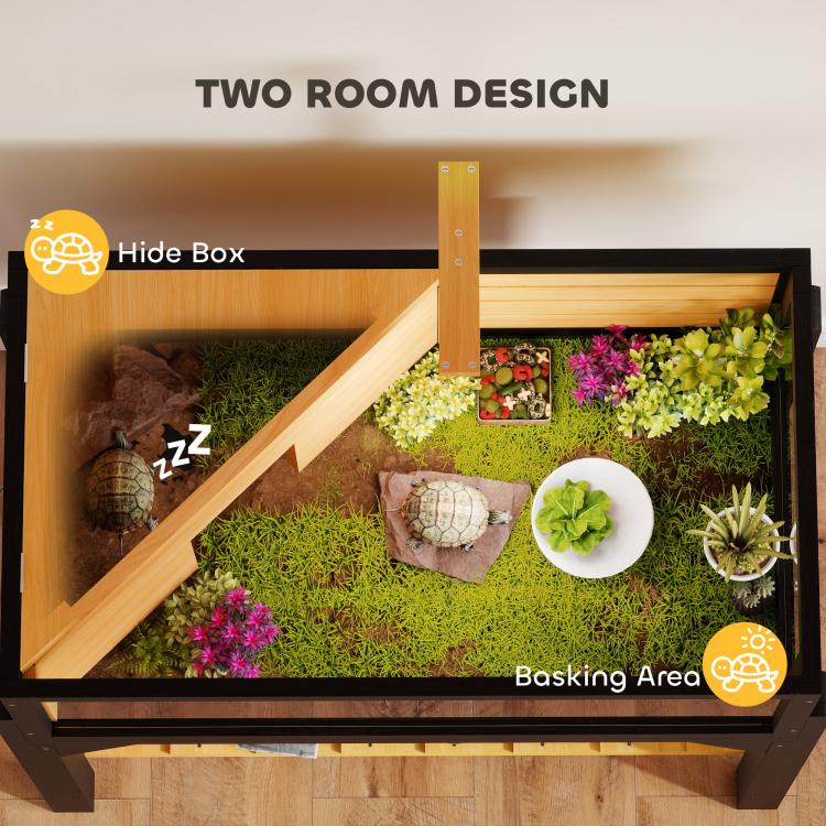 Wooden two-room tortoise habitat with grass bedding and basking area