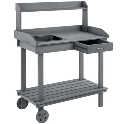 Gray wooden potting bench with sink, drawer, and two side storage shelves
