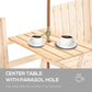 Natural wood center table on patio bench with two coffee cups and umbrella pole