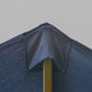 Dark blue rectangular patio umbrella canopy close-up with central pole