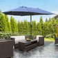 Dark blue rectangular patio market umbrella over outdoor lounge seating