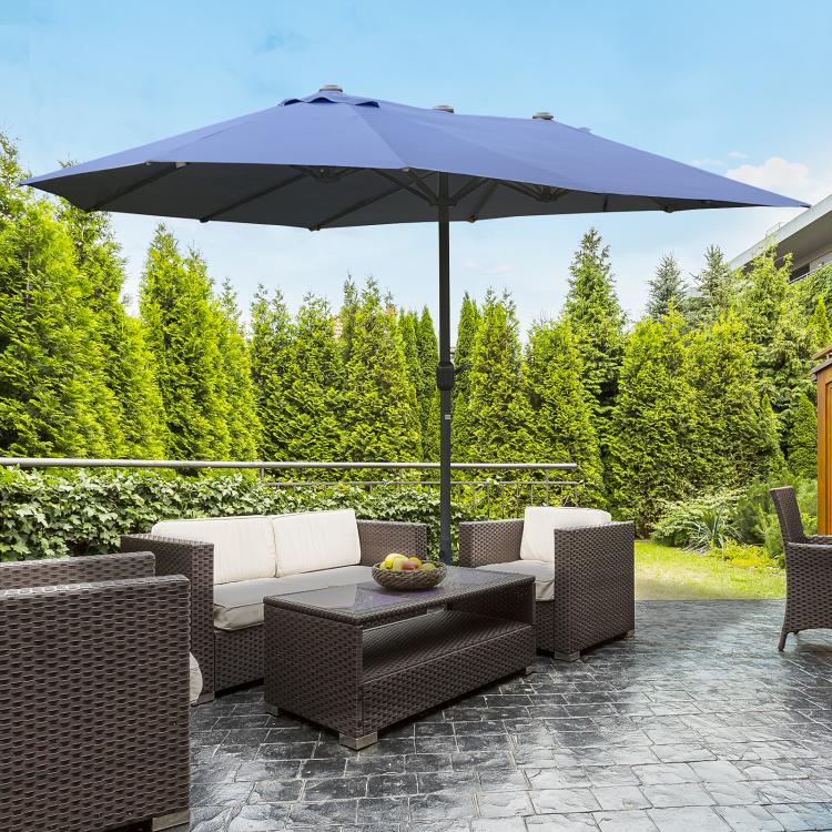 Dark blue rectangular patio market umbrella over outdoor lounge seating