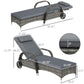 Gray cushioned adjustable chaise lounge chair with woven rattan frame and caster wheels