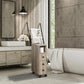 Freestanding oak bathroom cabinet with open shelves, door, drawer, and rolling casters