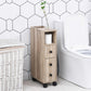 Oak bathroom cabinet with open top shelf, drawer, door cabinet, and rolling casters