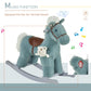 Blue plush rocking horse with bear plush and gray rockers, front-left angle