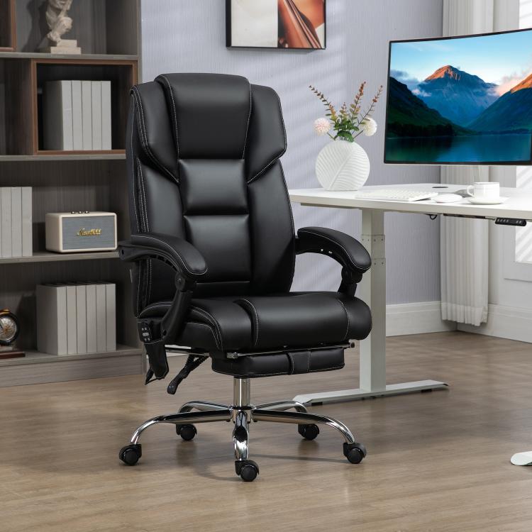 Black PU office massage chair with curved armrests, recline footrest, and chrome rolling base.