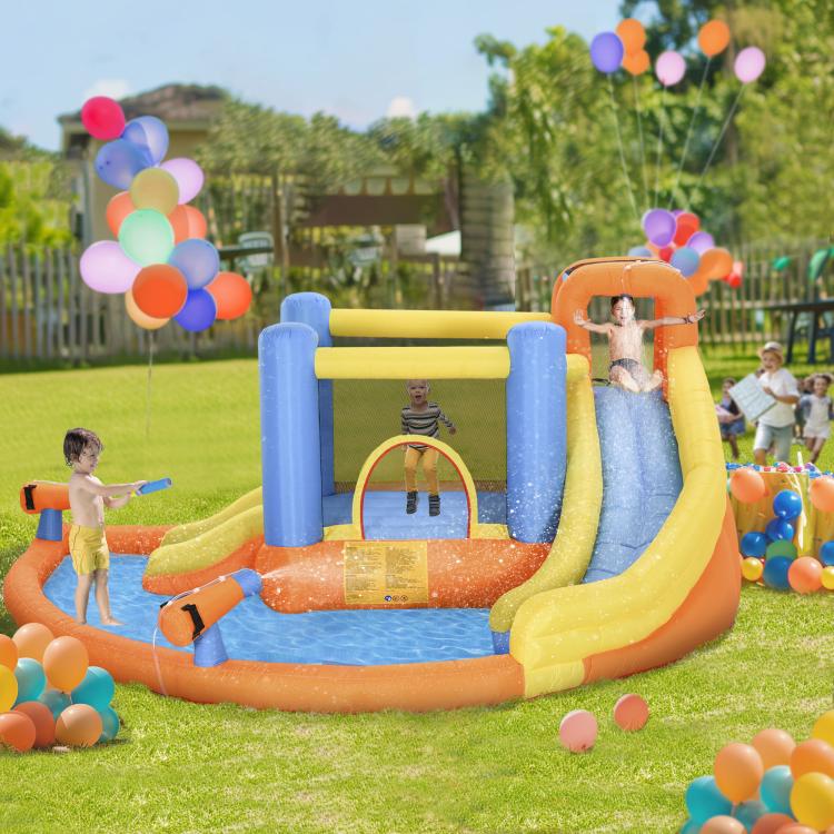 Kids inflatable bounce castle with yellow slide, blue sides, orange pool, and water mist