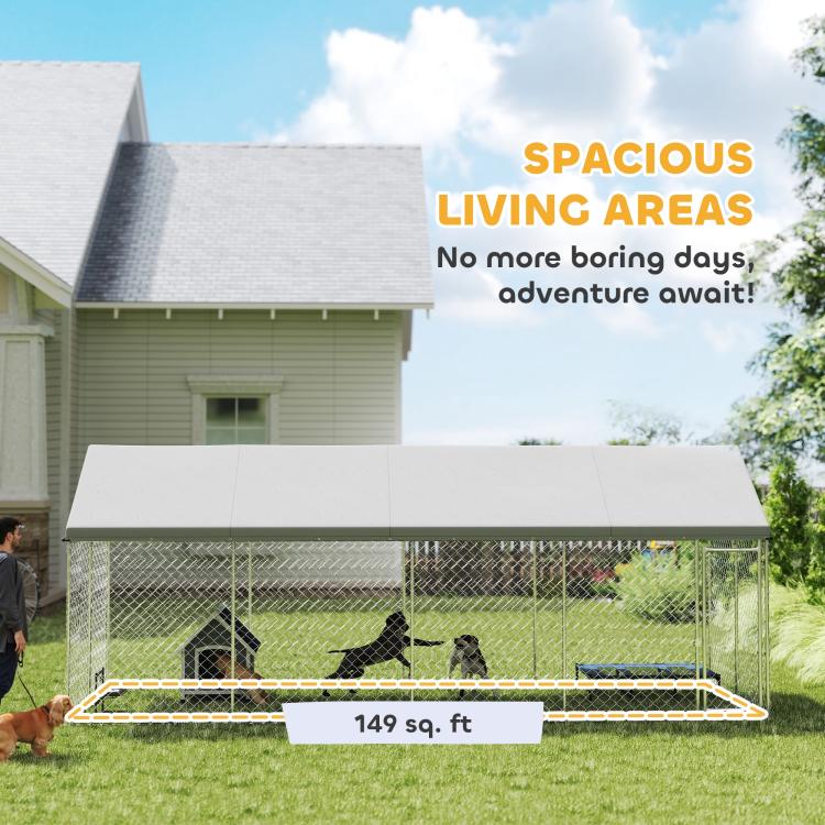 Large outdoor dog kennel with chain-link fencing and grey roof
