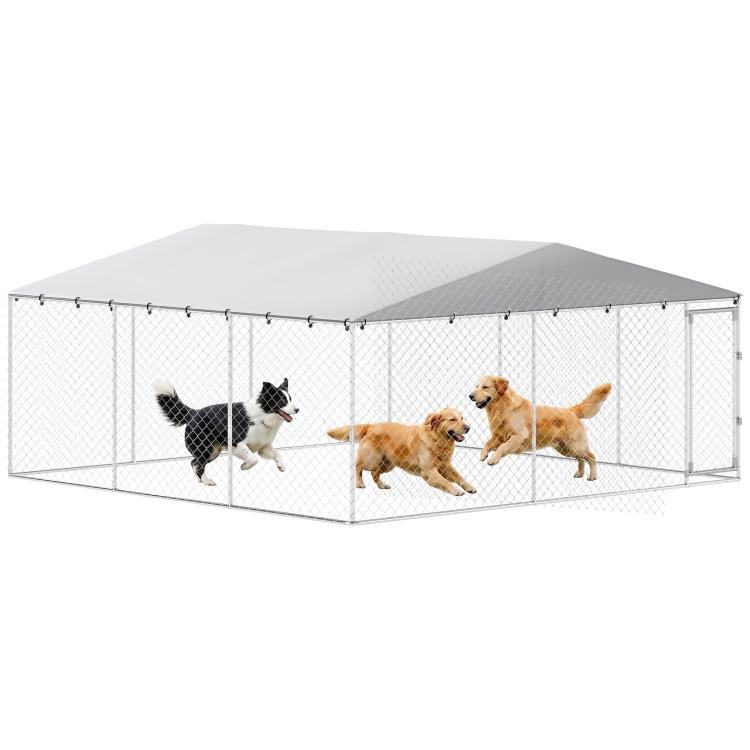 Outdoor dog kennel with silver metal frame, gray waterproof roof, and chain-link walls; three dogs inside